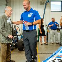 Seymour Padnos speaking with an engineering student.